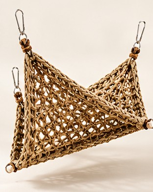 Natural woven reptile hammock in a habitat